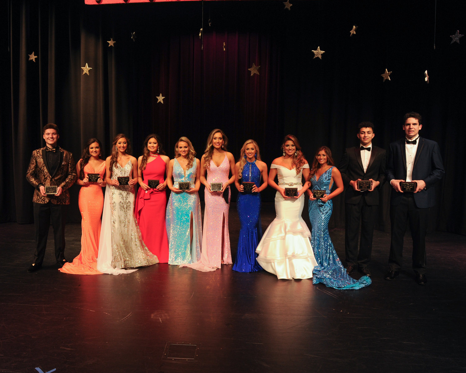 Madison Central High School hosted its annual Beauty and Beau pageant the week of February 8. Thursday, February 11 was junior night. Pictured are the winners. Left to right are beau Simon Tipton, Nora Beth Thomas, Ann Travis Hutchinson, Sarah Kate Killens, Annalise Ferrell, Kendall Starkey, Leighton Barrett, Abby Gables, Maddie Rives, beaus Youssef Tuwahni and Mack Gorton.