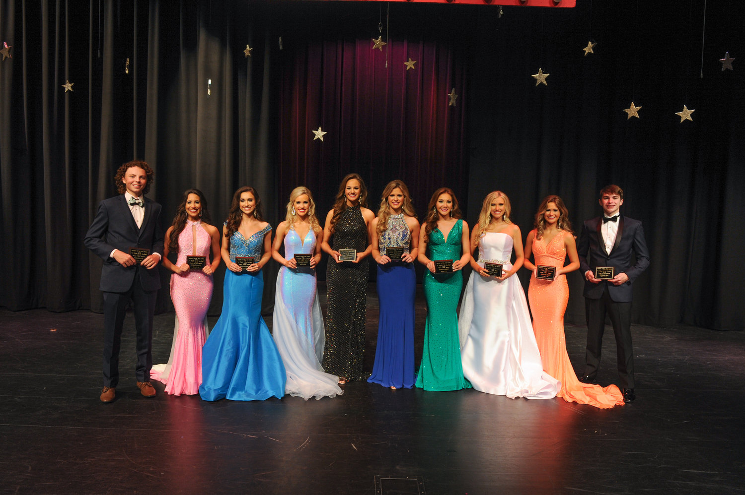Madison Central High School hosted its annual Beauty and Beau pageant the week of February 8. Tuesday, February 9 was sophomore night. Pictured are the winners. Left to right are beau Kamden Boyd, beauties Mary Scott Garrard, Avery Brady, Mary Kate Sandifer, Olivia Davidson, Megan Stokes, Davan Zenor, Bergen Bianchi, Casey Pierce and beau Aiden Allen.