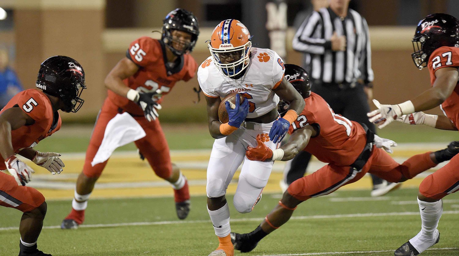 Madison Central's Broderick Washington (6) runs against Brandon in the MHSAA Class 6A Football State Championship game.