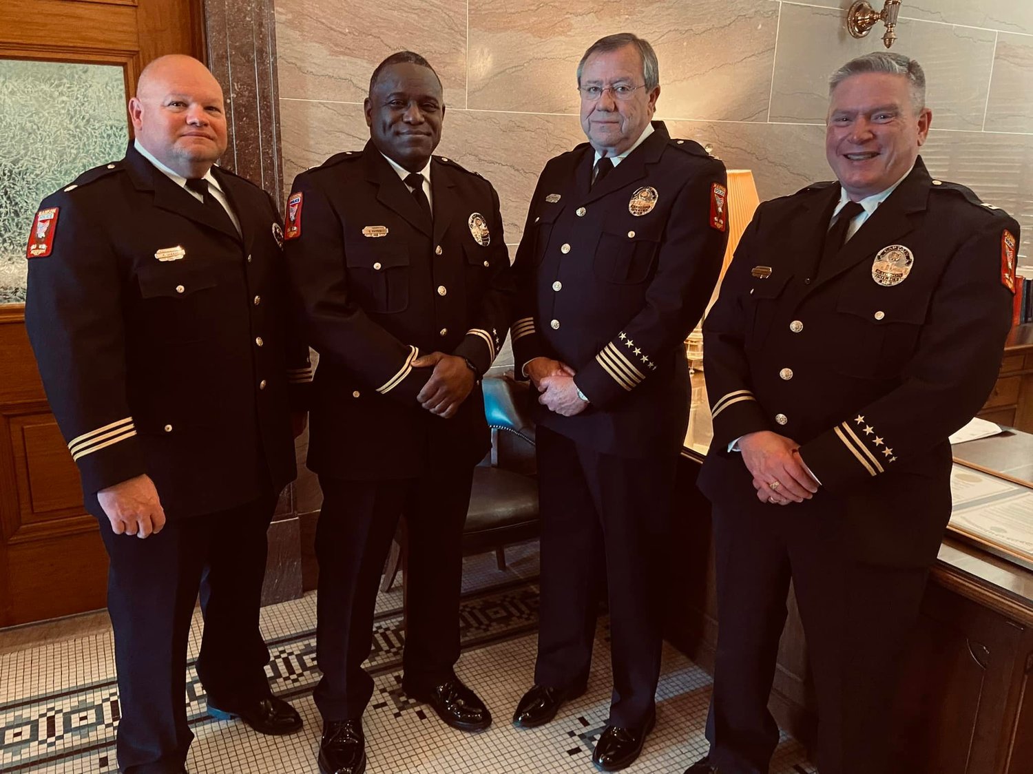 Madison Police Department Command Staff, from left, Assistant Chief Robert Sanders, Captain Stephen Patrick, Chief Gene Waldrop and Captain Kevin Newman.