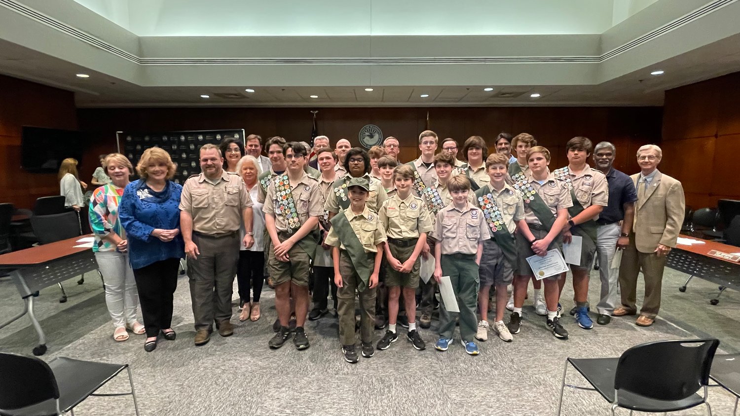 Scouts from Troop 15 in Madison were recognized for their service to the city of Madison by cleaning Brashear Creek and planting flowers in the botanical garden in front of the Montomgery House on Main Street. Pictured, from left: Alderman Janie Jarvis, Mayor Mary Hawkins-Butler, Scoutmaster Matthew Thompson, Skylar Gentry, Nick LaFluer, Will Thompson, Matt Caudell, Assistant Scoutmaster, Partha Yerra, George Parmley, Ryco Muha, George Barnett, Edward Sanders, Assistant Scoutmaster, Henry Neukirk, Drew Tucker, Whitt Deming, Henry Barnett, Chandler Tipton, Assistant Scoutmaster, Nick Tucker, Max Sanders, Michael Gentry, Assistant Scoutmaster, Logan Adams, Jacob Caudell, Wilson Caudell, Vijay Yerra, Assistant Scoutmaster, and Alderman Guy Bowering. Not pictured: James Parmley.