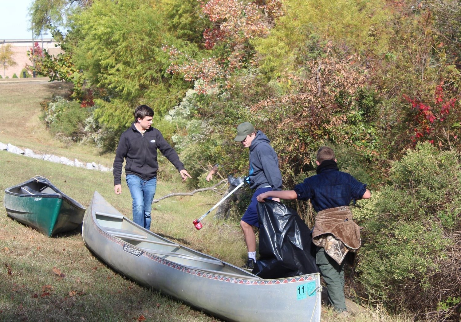 Scouts from Troop 15 in Madison used canoes to clean up Brashear Creek.