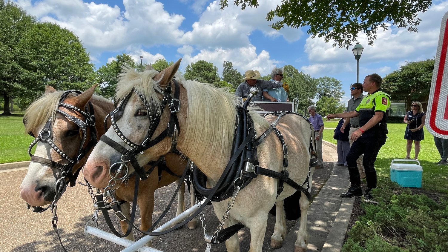 City officials rode in a horse carriage on Tuesday to honor Madison's historic roots while unveiling signs documenting different points during the city's growth from a small train stop to a flourishing community.