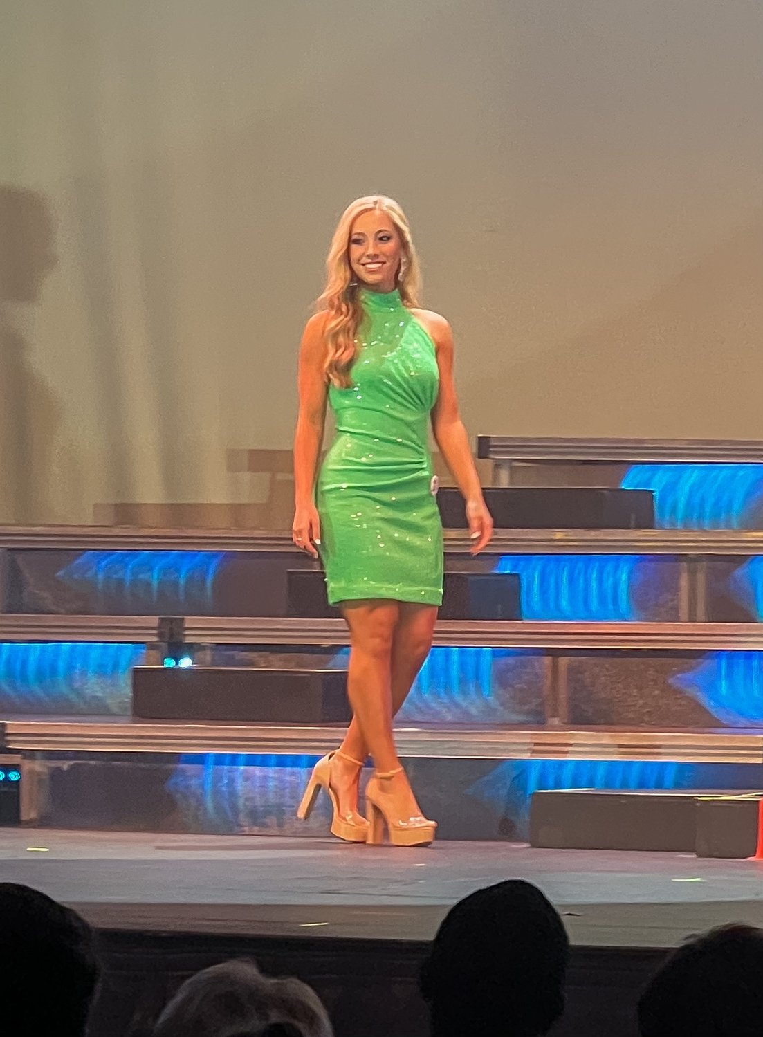 Aubree Dillon shows off her evening gown during the 2022 Miss Hospitality pageant.