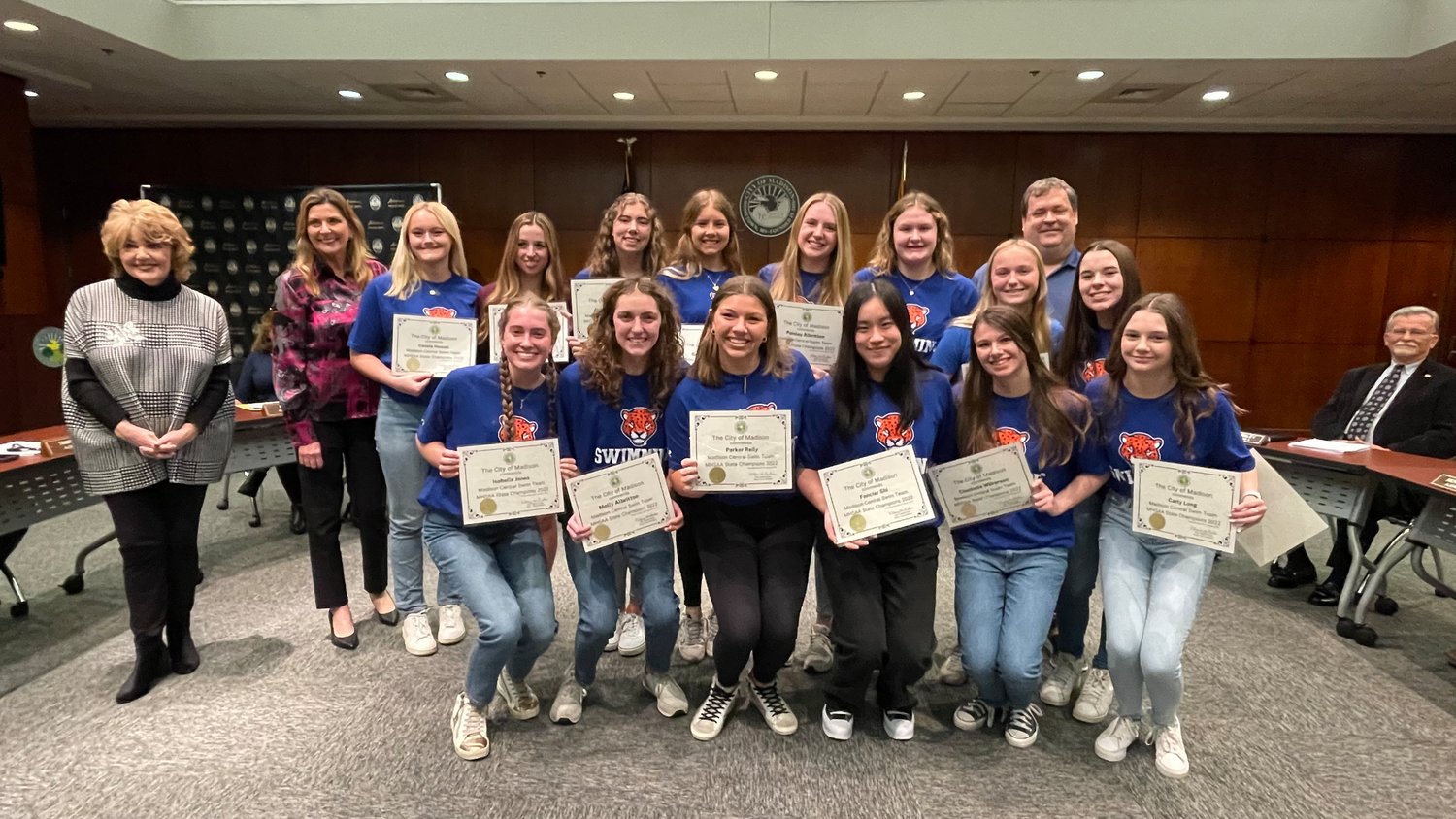The Madison Central Girls' Swim Team was recognized during Madison's Jan. 17 board meeting and received certificates honoring their ninth-consecutive state championship win. Each girl received a certificate, including Molly Albritton, Paisley Albritton, Sarah Covington, Abby Jo Flowers, Brooklyn Gallagher, Cassie Howell, Isabelle Jones, Carly Long, Mollee Messer, Isabelle Pike, Parker Reily, Fancier Shi, Ella Thomas, and Charlotte Wilkerson.