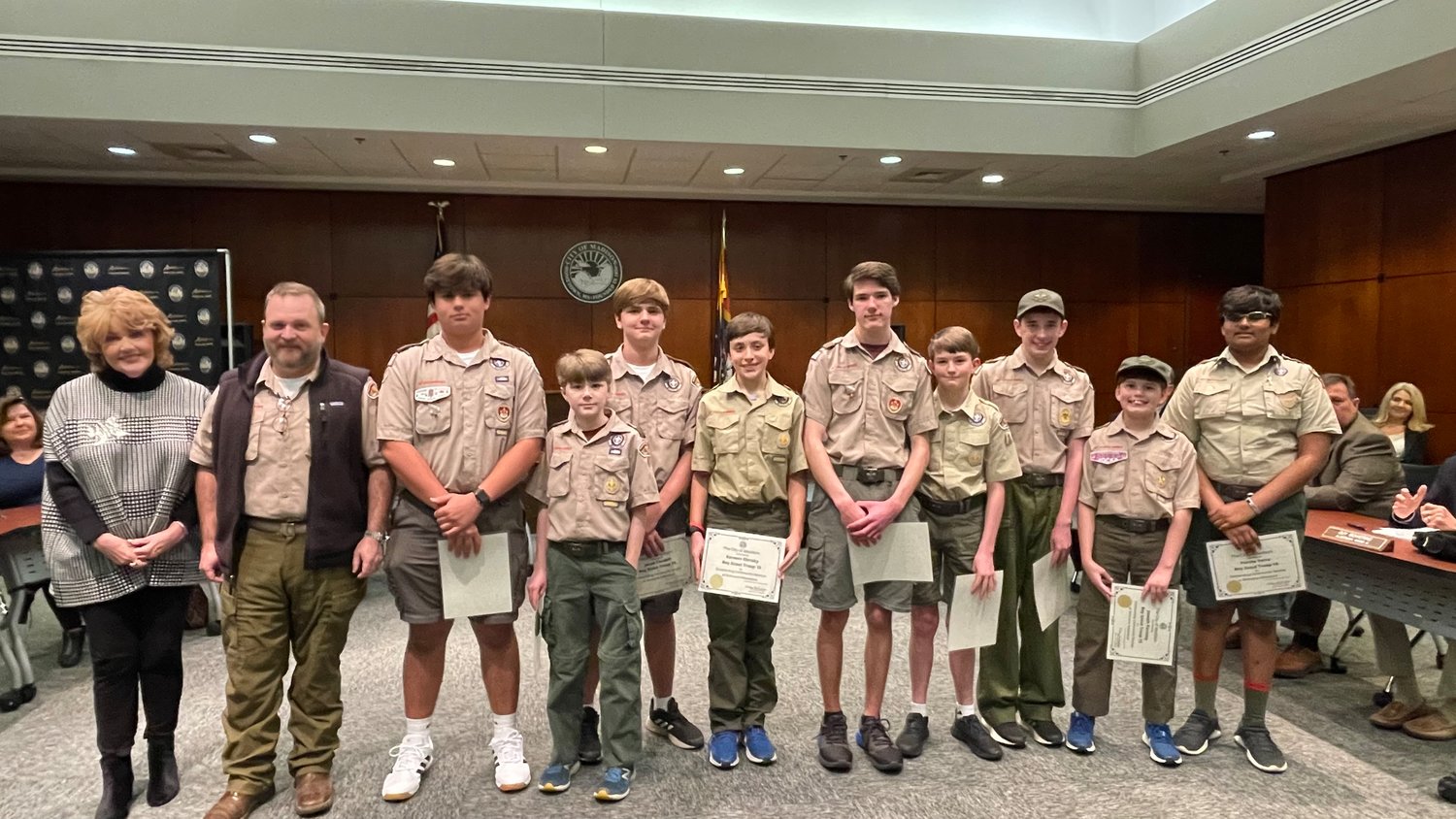 Boy Scout Troop 15 in Madison was recognized for their work on the Simmons Arboretum bridge, led by Life Scout Wilson Caudell. Each scout present received a certificate of appreciation from the city. Pictured, from left: Mayor Mary Hawkins Butler, Scoutmaster Matthew Thompson, Wilson Caudell, Henry Barnett, Jacob Caudell, Kareem Elearky, Skylar Gentry, Henry Newkirk, James Parmely, Joseph Parmely, and Patha Yerra.