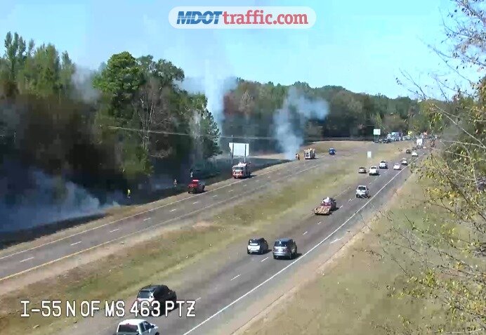 Mississippi Department of Transportation cameras recorded firefighters battling brush fires.